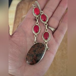 Elegant Silver Necklace with Red and Brown Accents